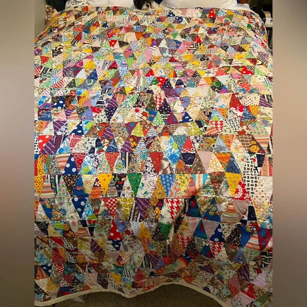 Vintage hand made quilt triangular fabric with solid reverse side